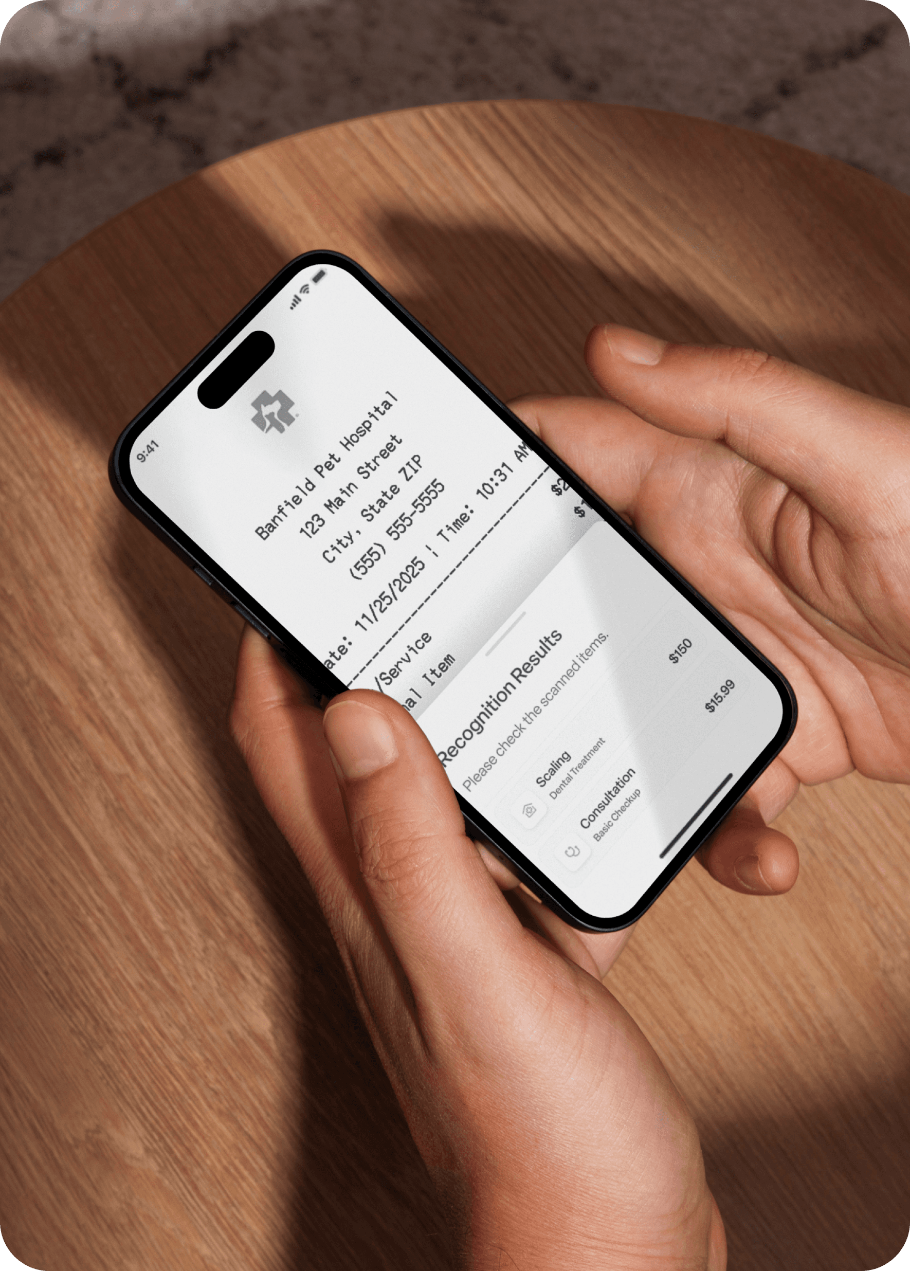 Hand holding phone with receipt